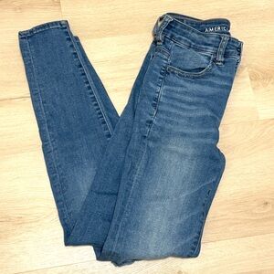 AMERICAN EAGLE Distressed light blue jeans, size 2